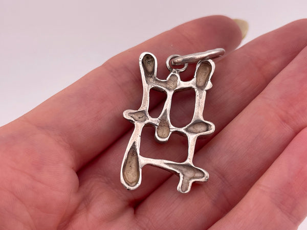 sterling silver stoneless artisan pendant