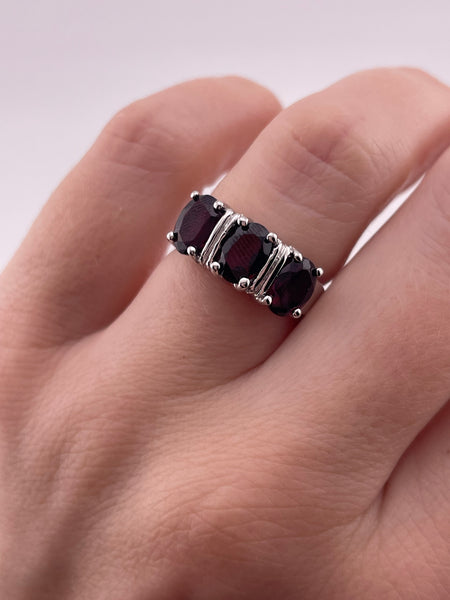 size 6 sterling silver rhodium plated faceted garnet row ring