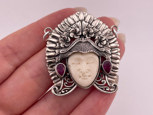 sterling silver faceted lab ruby molded plastic face pendant ***Chipped***