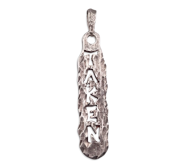 sterling silver "Taken" pendant