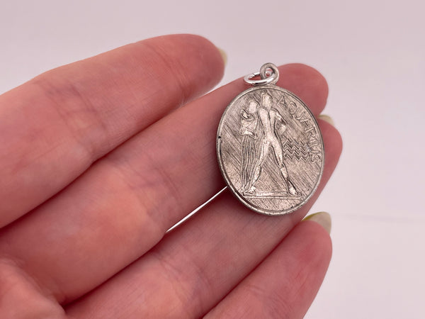 sterling silver Aquarius the Water-Bearer zodiac etched pendant