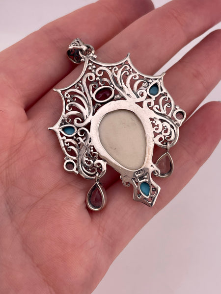 sterling silver molded plastic face quartz lab ruby stabilized turquoise pendant