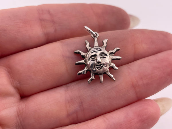 sterling silver small sun w/ face charm pendant