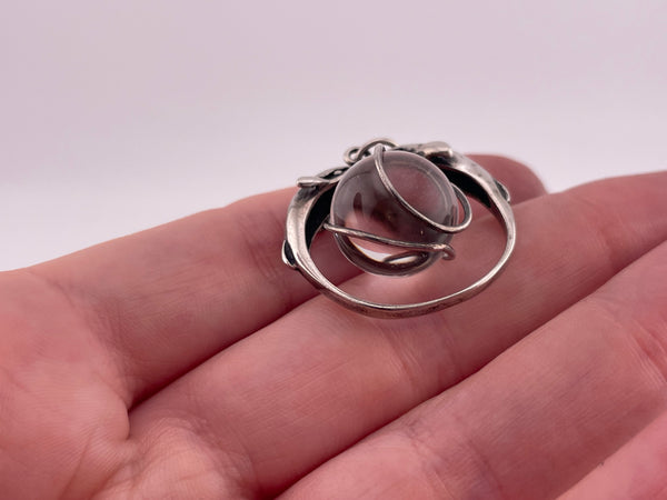 sterling silver quartz orb dolphins pendant