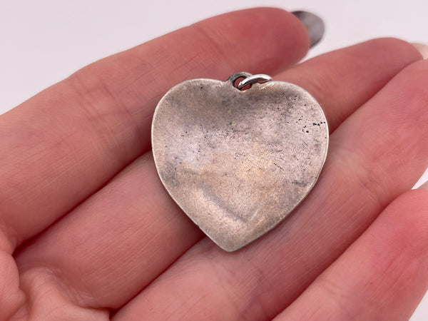 sterling silver kissing cherub heart pendant