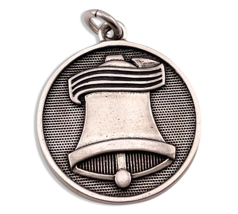 sterling silver bell pendant