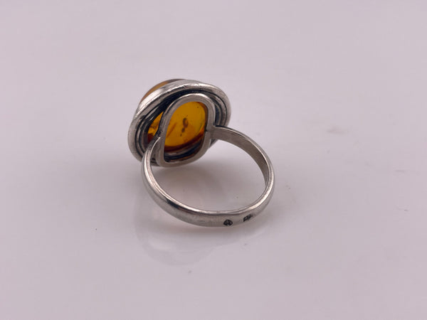 size 8.5 sterling silver round amber ring