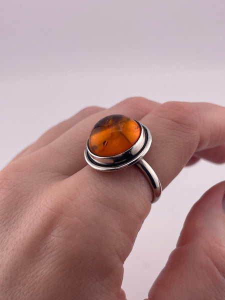 size 8.5 sterling silver round amber ring
