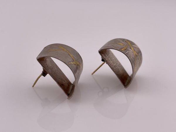 sterling silver and gold matte artisan curved post earrings