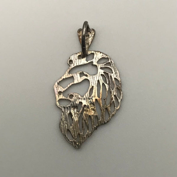sterling silver lion head cut-out design pendant