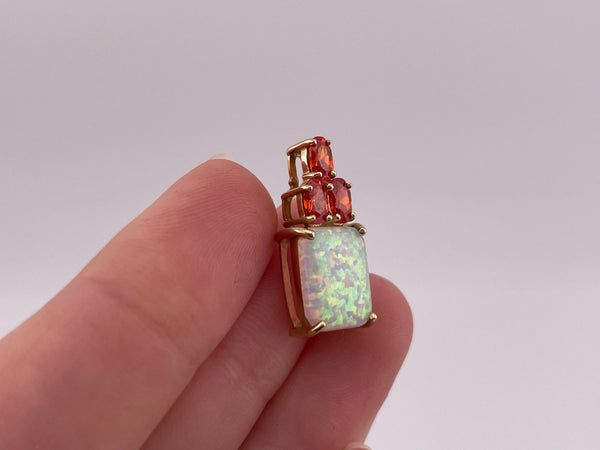 10k gold synthetic opal red/orange faceted glass charm pendant
